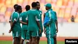 Coach Stephen Keshi speaks to members of the Super Eagles at practice in Abuja before their World Cup qualifier against Ethiopia.