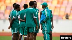 Coach Stephen Keshi speaks to members of the Super Eagles at practice in Abuja before their World Cup qualifier against Ethiopia.