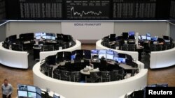 FILE - The German share price index DAX graph is pictured at the stock exchange in Frankfurt, Germany, July 22, 2020. 