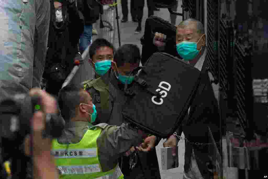 Democracy advocate Jimmy Lai, right, arrives at Hong Kong&#39;s Court of Final Appeal.