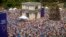 People holding European Union and Moldovan flags fill the Great National Assembly Square in Chisinau, Moldova, May 21, 2023.