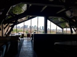 La Haut restaurant, part of Les Bistrots Pas Parisiens chain with a view of Paris. (Photo: Lisa Bryant / VOA)