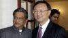 Indian Foreign Minister S.M. Krishna, left, shakes hands with Chinese Foreign Minister Yang Jiechi before a meeting in New Delhi, India, March 1, 2012.