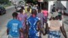 People march in the streets of Lagos as part of the National Day of Mourning, aiming at commemorating all the lives lost to violent killings and mass displacement in the country, on May 28, 2018.