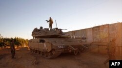 Israeli soldiers are positioned near the northern Israeli settlement of Shtula along the border with Lebanon, May 19, 2021. Several rockets were fired from southern Lebanon towards Israel Wednesday.