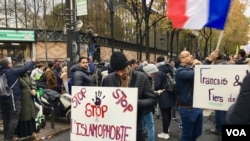 FILE - Protesters are seen at a march against Islamophobia in Paris, France, Nov. 2019. (Lisa Bryant/VOA)