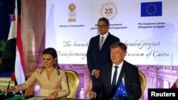 Ivan Surkos, Head of the EU Delegation to Egypt, and Sahar Nasr, Egypt's Minister for Investment and International Cooperation, sign an agreement for a European grant to renovate the Egyptian Museum, in Cairo, Egypt, June 16, 2019.