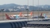 Passenger planes are seen at Gimpo Airport in Seoul, South Korea, on Nov. 9, 2024. North Korean GPS jamming attacks affected dozens of civilian aircraft in South Korea, officials said.