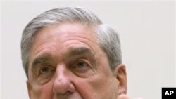 FBI Director Robert Mueller testifies on Capitol Hill in Washington before the House Judiciary Committee hearing on FBI Oversight, March 16, 2011