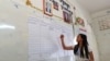 A local election official counted the votes at Sla Kaet polling station in Chrey Koung, Battambang province, Cambodia, June 4, 2017. (Ith Sotheouth/VOA Khmer)