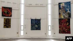 FILE—Wall tapestry art is pictured in a gallery at the Manufacture Senegalese des Arts in Thies on April 22, 2024.