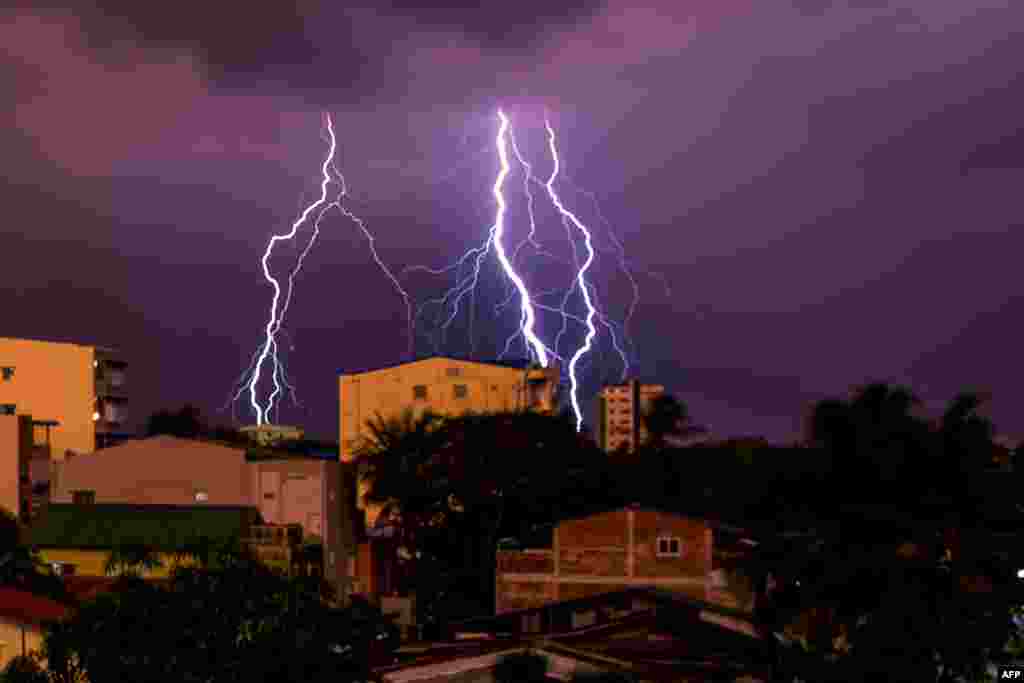 Lightning strikes over a residential area in Yangon, Myanmar.