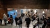 Local residents take shelter in a metro station during an air strike alarm in Kyiv, on November 21, 2024, amid the Russian invasion of Ukraine.