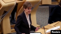 Scottish First Minister Nicola Sturgeon delivers a statement in Edinburgh, announcing that Scotland will be placed in lockdown for the duration of January on Jan. 5, 2021.