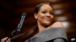 Singer Rihanna addresses an audience after being presented with the 2017 Harvard University Humanitarian of the Year Award during ceremonies, Feb. 28, 2017.