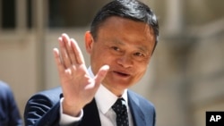 FILE - Founder of Alibaba group Jack Ma arrives for the Tech for Good summit in Paris, France, May 15, 2019. Ma recently stepped down as chairman of the e-commerce giant.