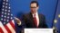 FILE - U.S. Treasury Secretary Steven Mnuchin speaks during a news conference with France's Economy Minister Bruno Le Maire after a meeting in Paris, Feb. 27, 2019.