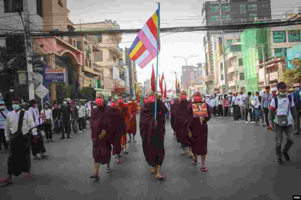 Buddhist monks march during a nationwide protest against the military coup in Mandalay, Myanmar, Feb. 22, 2021. (Credit: VOA Burmese)