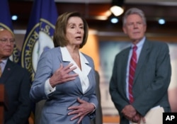 FILE - Speaker of the House Nancy Pelosi responds to a question about her creation of a select committee to investigate the Jan. 6 insurrection at the U.S. Capitol, during a news conference, June 30, 2021.