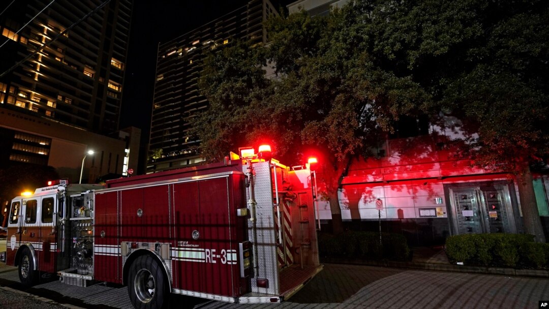 A firetruck is positioned outside the Chinese Consulate Wednesday, July 22, 2020, in Houston. Authorities responded to reports of a fire at the consulate. Witnesses said that people were burning paper in what appeared to be trash cans, according to…