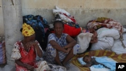 Refugees from the Tigray region of Ethiopia wait to register at the UNCHR center at Hamdayet, Sudan, on Nov. 14, 2020. 