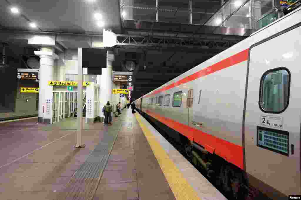 A train to Rome is seen after the Italian government imposed a virtual lockdown on the north of the country, in Bologna, Italy.