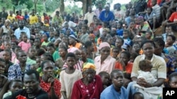 Southern Sudanese wait for food, shelter, security and medicine at the village of Nzara, along Sudan's border with DR Congo, 18 Aug 2010