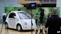 The Waymo driverless car is on display during a Google event, Dec. 13, 2016, in San Francisco.