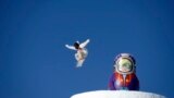 Snowboarder Sven Thorgren of Sweden trains on the slopestyle snowboard course during practice for the 2014 Sochi Winter Olympics in Rosa Khutor, Russia.