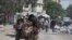 Wasu Falasdinawa yayin da suke ficewa daga Gaza