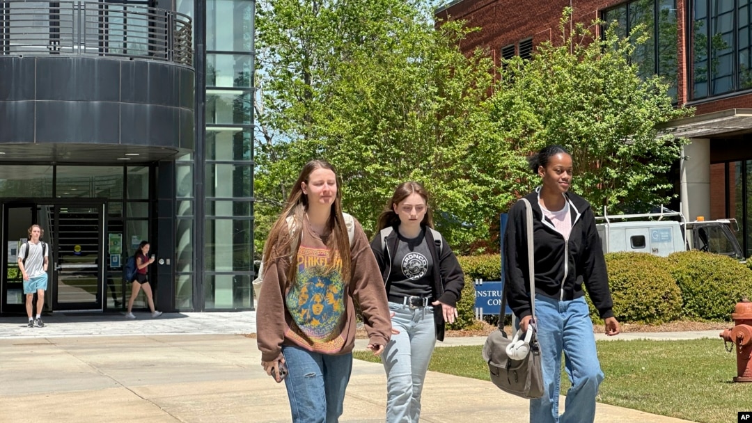 FILE - Students walk across the Gordon State College campus on April 16, 2024, in Barnesville, Ga.
