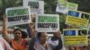 FILE - Pakistani human rights activists rally against disappearances of people on the International Day of the Victims of Enforced Disappearance in Lahore, Pakistan, Aug. 30, 2016.