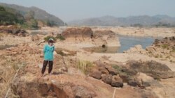 Bula Tawan has been fishing along the Mekong River near Nong Khai, Thailand, for more than 40 years. (Steve Sandford/VOA)