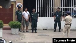 FILE: Government critic Kung Raiya arrives at Phnom Penh Municipal Court in Phnom Penh, Cambodia, July 10, 2019. (Photo from LICADHO) 