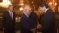 FILE - Afghanistan Deputy Foreign Minister, Hekmat Khalil Karzai, right, shakes hands with Sartaj Aziz, adviser to the Pakistani prime minister on foreign affairs, at a January 2016 meeting aimed at laying the roadmap for peace talks with the Taliban, in Islamabad, Pakistan.