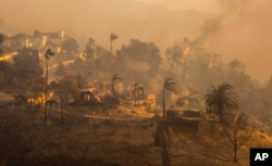 Homes destroyed by the Mountain Fire are pictured successful  Camarillo, Calif., Nov. 6, 2024,