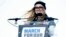 FILE - Delaney Tarr, a survivor of the mass shooting at Marjory Stoneman Douglas High School in Parkland, Florida, speaks during the "March for Our Lives" rally in support of gun control in Washington, March 24, 2018.