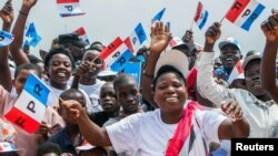 FILE - Supporters of the ruling Rwandan Patriotic Front (RPF) cheer during a rally by Rwandan President Paul Kagame in Nyanza, Rwanda, July 14, 2017.