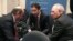 Eurogroup President Jeroen Dijsselbloem, center, chats with Luis de Guindos Jurado, Minister of the Economy and Finance of Spain, left, and German Finance Minister Wolfgang Schaeuble, Zappeion Hall, Athens, April 1, 2014.