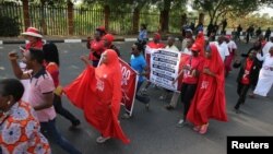 FILE - Members of the #BringBackOurGirls campaign rally in Abuja, to mark 1,000 days since over 200 schoolgirls were kidnapped from their secondary school in Chibok by Islamist sect Boko Haram, Jan. 8, 2017. (REUTERS/Afolabi Sotunde)