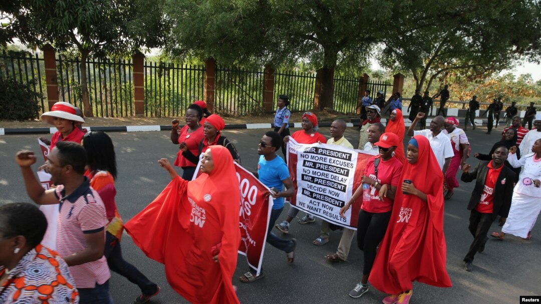 FILE - Members of the #bringbackourgirls campaign rally in Nigeria's capital, Abuja, to mark 1,000 days since over 200 schoolgirls were kidnapped from their secondary school in Chibok by Islamist sect Boko Haram, Jan. 8, 2017.