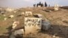Mosul Residents Repair IS-desecrated Graves