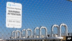 FILE - In this Nov. 3, 2015 photo, the Keystone Steele City pumping station, into which the planned Keystone XL pipeline is to connect, is seen in Steele City, Nebraska.