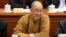 Shi Xuecheng, abbot of the Longquan Temple, attends an opening session of the Chinese People's Political Consultative Conference at the Great Hall of the People in Beijing, March 3, 2016.