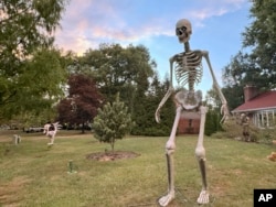 A 3.6-meter Home Depot skeleton presides over the front yard of a Cincinnati home on Sept. 24, 2024.