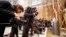 Media films the stove at the Sistine Chapel in the Vatican, March 9, 2013.