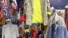 This shop in Nairobi's Toi market sells imported, inexpensive used clothing. (M. Yusuf/VOA)