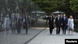 U.S. President Joe Biden and first lady Jill Biden visit the Korean War Memorial with South Korean President Yoon Suk Yeol and his wife Kim Keon Hee, in Washington, April 25, 2023. 