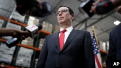 FILE - Treasury Secretary Steven Mnuchin speaks at a news conference, Aug. 28, 2017, in Las Vegas.