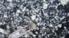 An aerial view shows a boat making its way through the icy water of Lidingo, near Stockholm, Sweden.